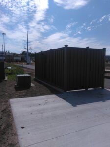 a brown privacy fence