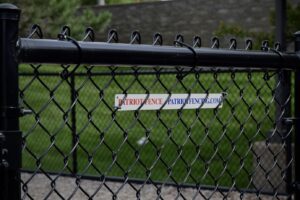 patriot fence logo on a fence close up